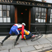 A person being dragged out of a pub in Kilkenny wearing cycling gear and screaming &#039;I hur...jpg