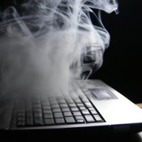 A computer with smoke coming out of it (1).jpg